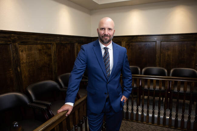 Ladegaard attorney courtroom litigator